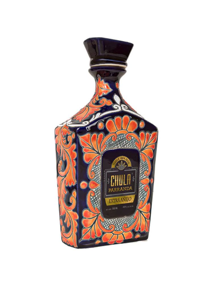 Chula Parranda Extra Añejo Tequila Ceramic bottle on white background.